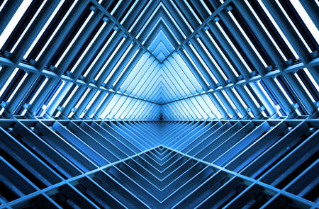 metal structure similar to spaceship interior in blue light metal structure similar to spaceship interior in blue light