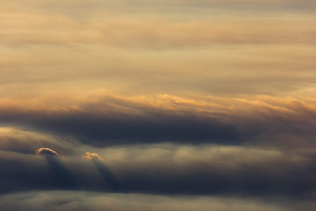 beautiful view of sky and cloud from airplane, sunset with a height of 33,000 km. Top view.