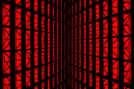 Metal design of an interior in a modern building in red lightの写真素材