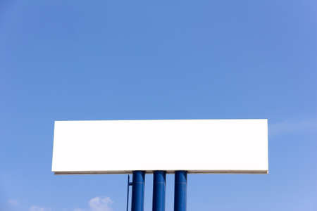 blank billboard for new advertisement against blue skyの写真素材