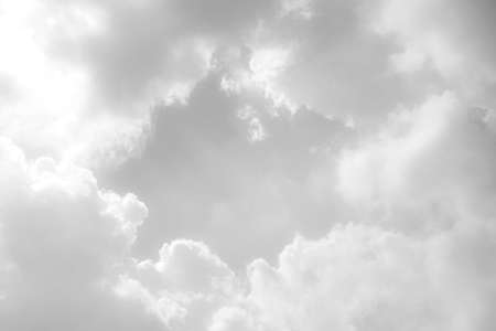 White clouds in the sky, black and white photoの写真素材