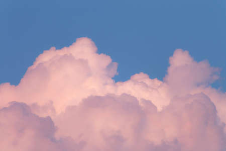 pink clouds in the blue skyの写真素材