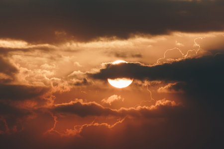 natural beautiful golden sunset or sunrise with clouds. nature background and copy space concept.