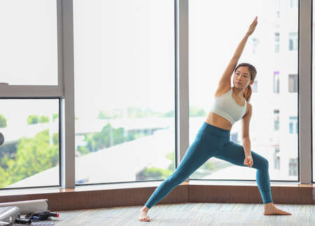 A sporty girl doing workout.の写真素材