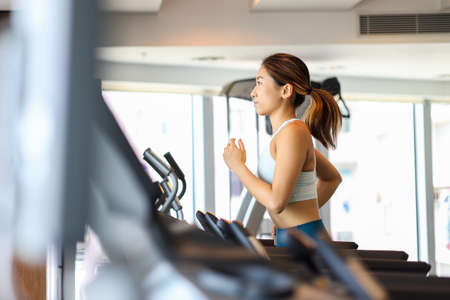 A sporty girl doing workout.の写真素材
