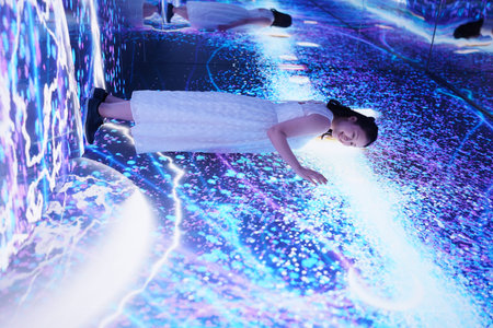 Beautiful asian woman in the white dress with neon light.