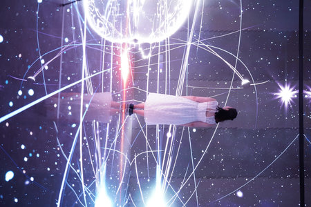 Unrecognizable businesswoman looking at abstract glowing network hologram. Toned image double...