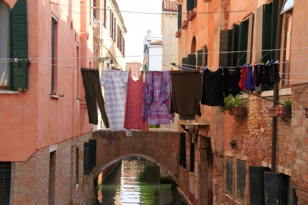 View of typical venetian architecture and drying clothesの写真素材