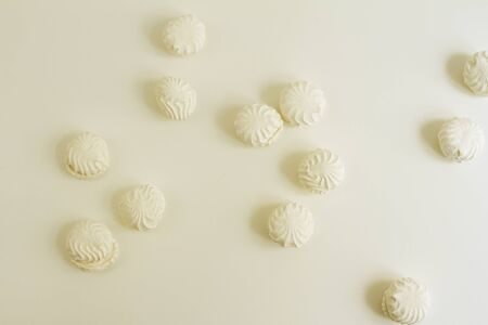 Group of typical latvian marshmallow like sweets called zefiri. Top view image with vintage filter.の写真素材