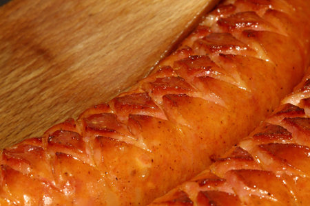 Pair of pork sausages in a pan