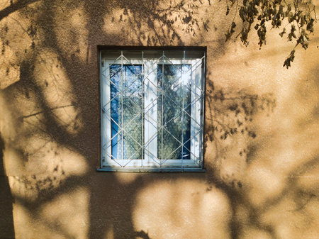 A minimalist architectural study at Ecseri ut in Budapest. Features warm morning sunlight and...