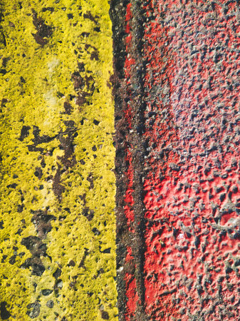 Bold primary colors meet weathered urban surfaces in this high-quality detail from Budapest....