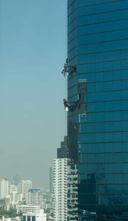 wipe the glass building blue skyの写真素材