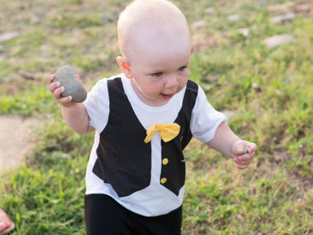 Happy mother with cute baby boy having tropical vacation on Maldives. Kid playing among palm trees.の写真素材