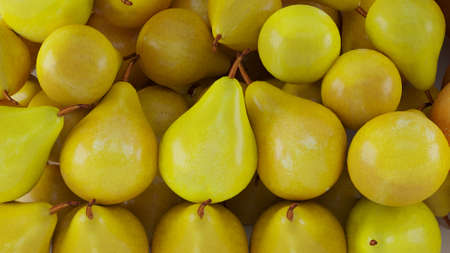 yellow pears in a marketの写真素材