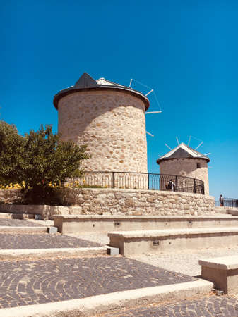 Before 1920s Turkish town of Alacati was predominantly Greek. Now this travel destination in the area of Izmir and Cesme experiences resurgence of interest and cherishes intercultural heritage.の写真素材