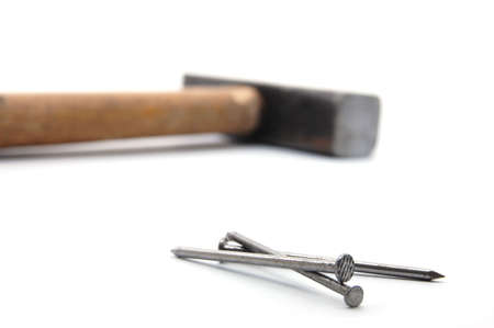 Nails and Hammer isolated on whote background.Hammer und Nagel auf weiÃem Grund.の写真素材