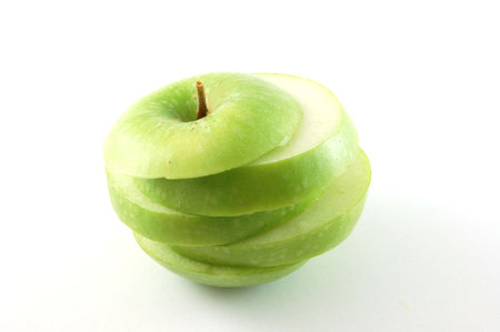 A cutted apple isolated on a white backgound.の写真素材