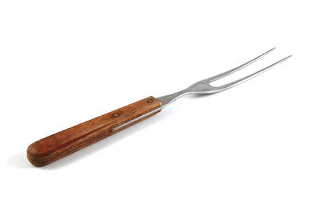 Fork with brown handle  isolated on white background.の写真素材