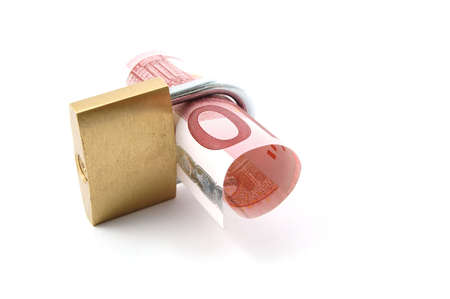 padlock with money isolated on a white backgroundの写真素材
