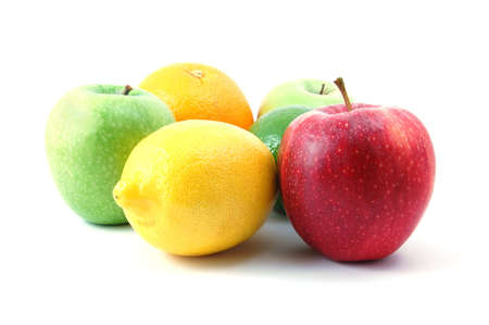 fruits like apple , lemon , citron  orange and lime  isolated on a white backgroundの写真素材
