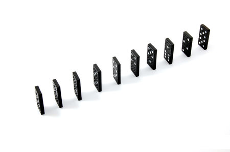 chain of dominoes isolated on a white background