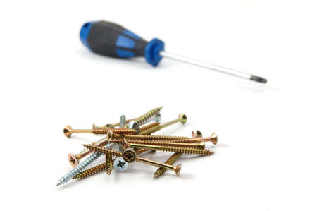 screwdriver and some screws isolated on white backgroundの写真素材