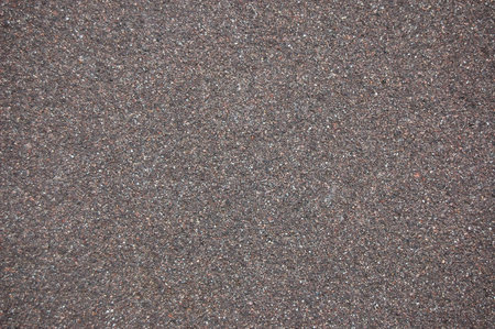 asphalt texture of a street can be use as backgroundの写真素材