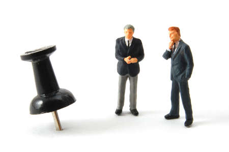 business man and push pin isolated on white backgroundの写真素材