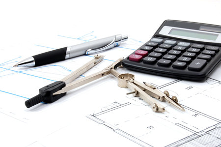 architecture or business still life with plans as backgroundの写真素材