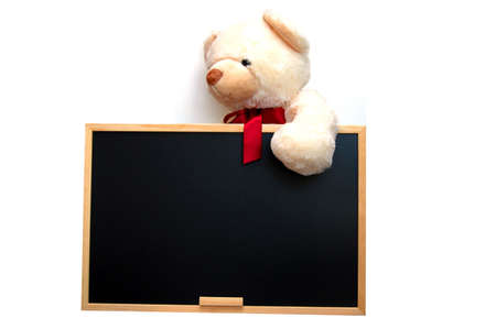 isolated teddy with empty blackboard on white backgroundの写真素材