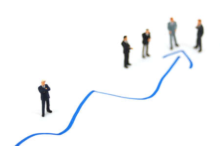 business peoples on economic chart background talking の写真素材