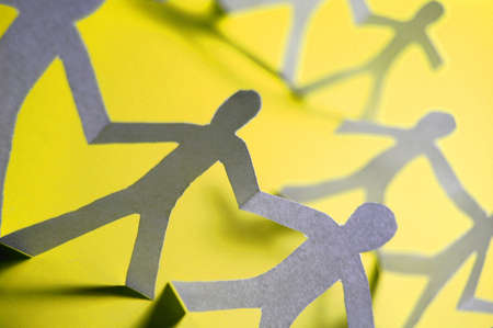 team of paper people having a partyの写真素材