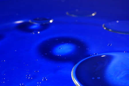 strange and abstract blue water bubble background の写真素材