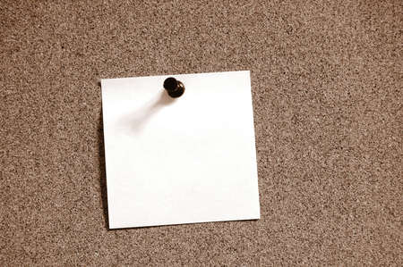 blank and empty sheet paper with pin on bulletin board の写真素材