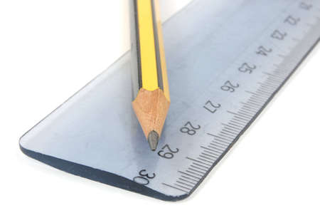 pencil and ruler isolated on white backgroundの写真素材