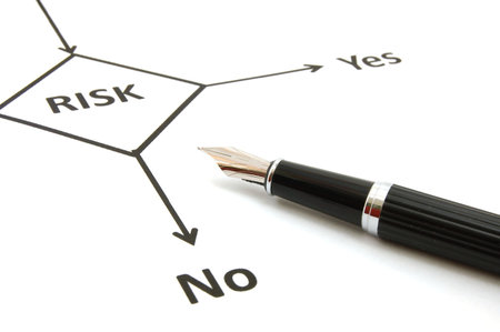 risk management chart and pen showing business concept                                    