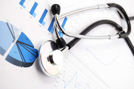 stethoscope on medical data chart in hospitalの写真素材