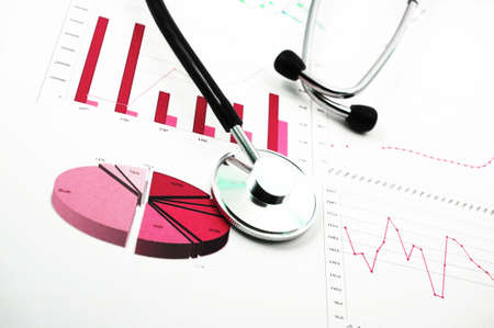 health and medical concept with stethoscope on diagramの写真素材