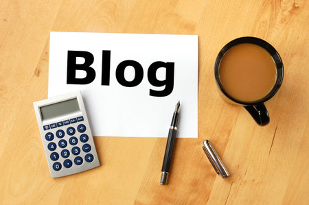 internet web blog or weblog concept with coffee pen and paperの写真素材