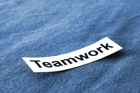 business teamwork concept shown by sheet paper with a word                                    の写真素材
