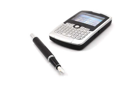 cell phone isolated on white showing communication conceptの写真素材