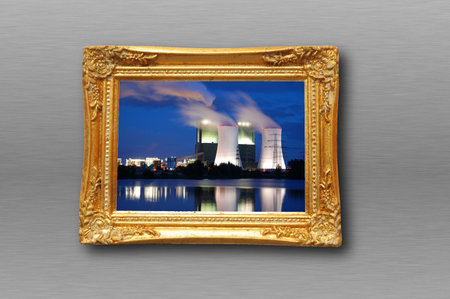 picture of industry at night in image frame on a wall