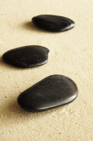 zen stone spa or wellness concept with sand の写真素材