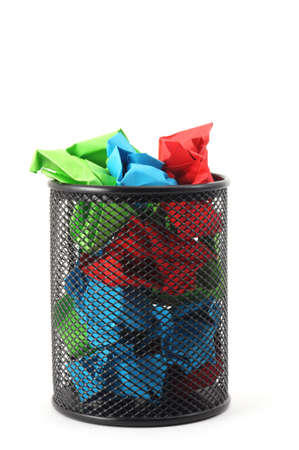 trash or rubbish paper in basket isolated on white backgroundの写真素材