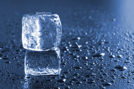 ice cube macro in blue with water drops