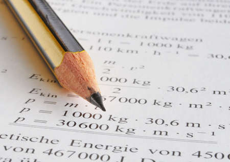 physics science at school with pencil  book and formulaの写真素材