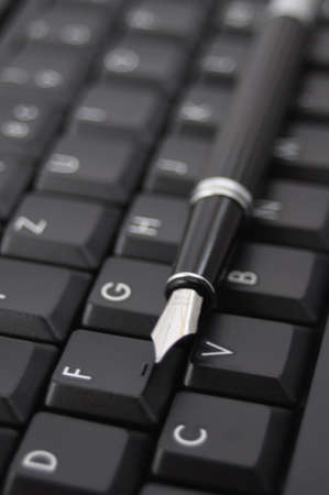 pan and black computer keyboard showing communication conceptの写真素材