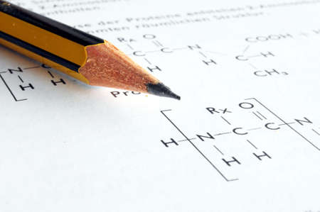 chemical or chemistry education with pen formula book and paperの写真素材