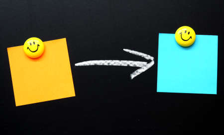 sheet of paper and chalk arrow with copyspace for text messageの写真素材